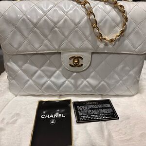 (SOLD)Authentic Chanel jumbo single flap shoulder bag . Patent/enamel leather